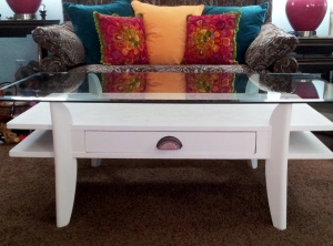 Coffee table all pretty and white.